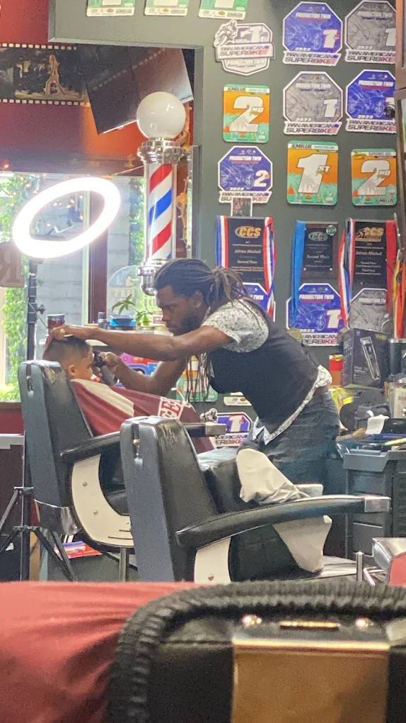 Adrian - Master Barber and Shop Owner at Work